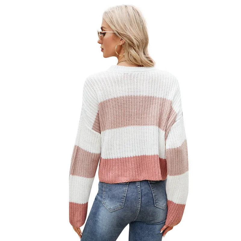 Women's short striped loose pullover sweater in acrylic knit, shown in pink, dark blue, and yellow colour options.