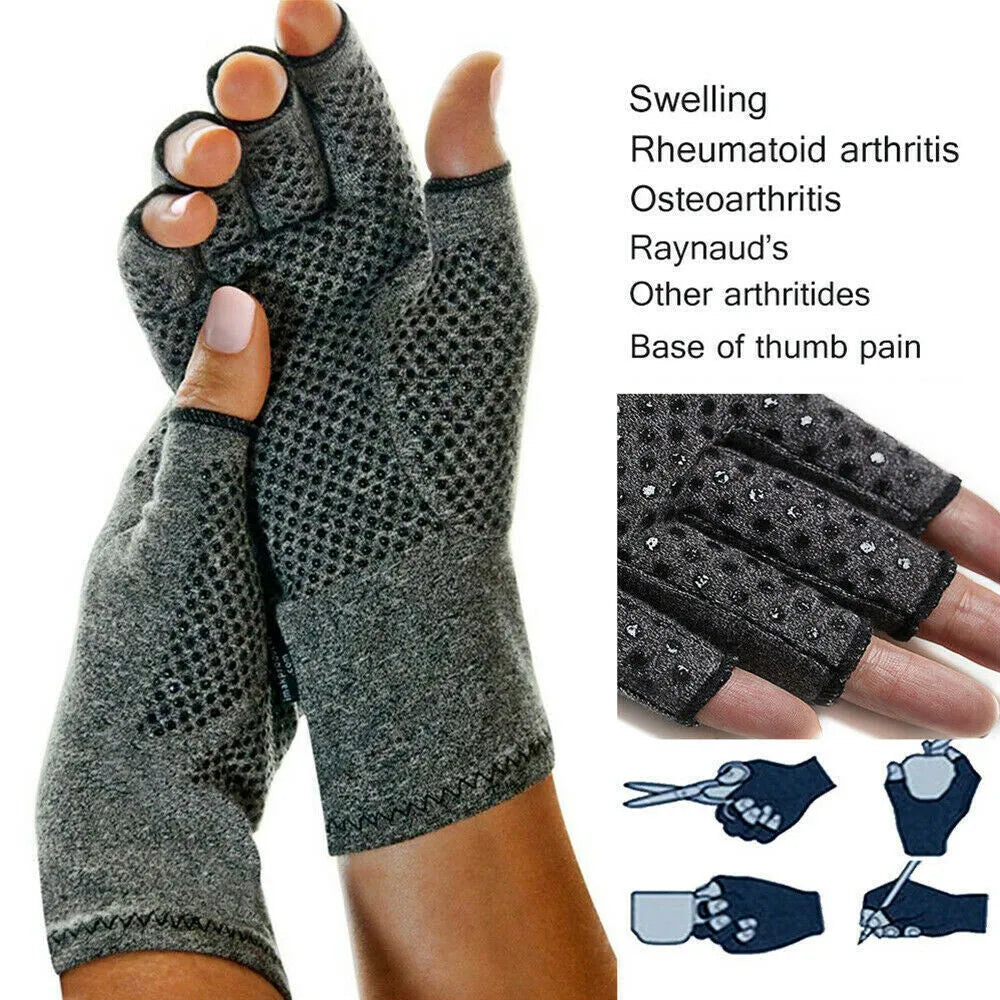 Grey half finger joint compression gloves with anti-slip texture on a flat surface.