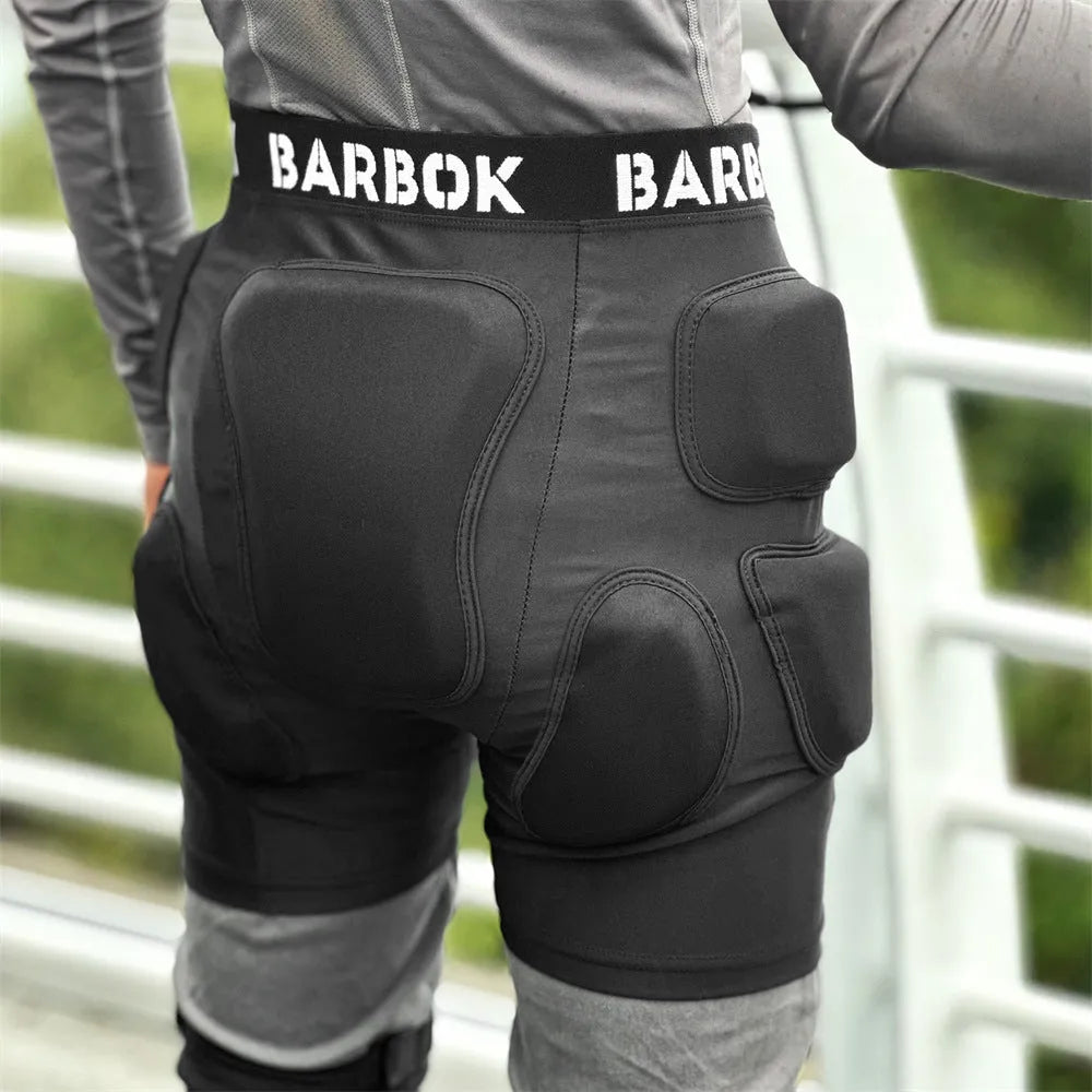 Black skating hip protection trousers with NBR foam padding for fall prevention