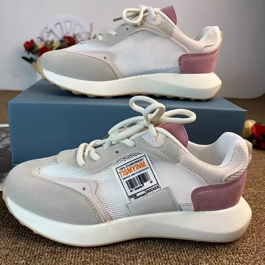 Women's grey and pink low-top retro sneakers with mesh lining and rubber sole