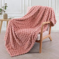 Children's polyester plaid blanket in camel colour with solid pattern showing texture