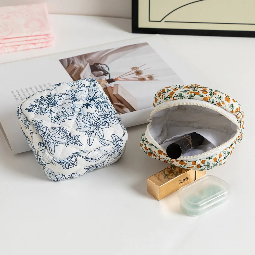 Women's floral polyester key storage bag with breathable fabric and sewing thread detailing