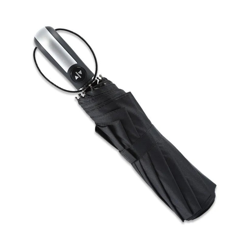 Triple-folding automatic business umbrella with steel frame and rubber handle in black, navy, or wine red.