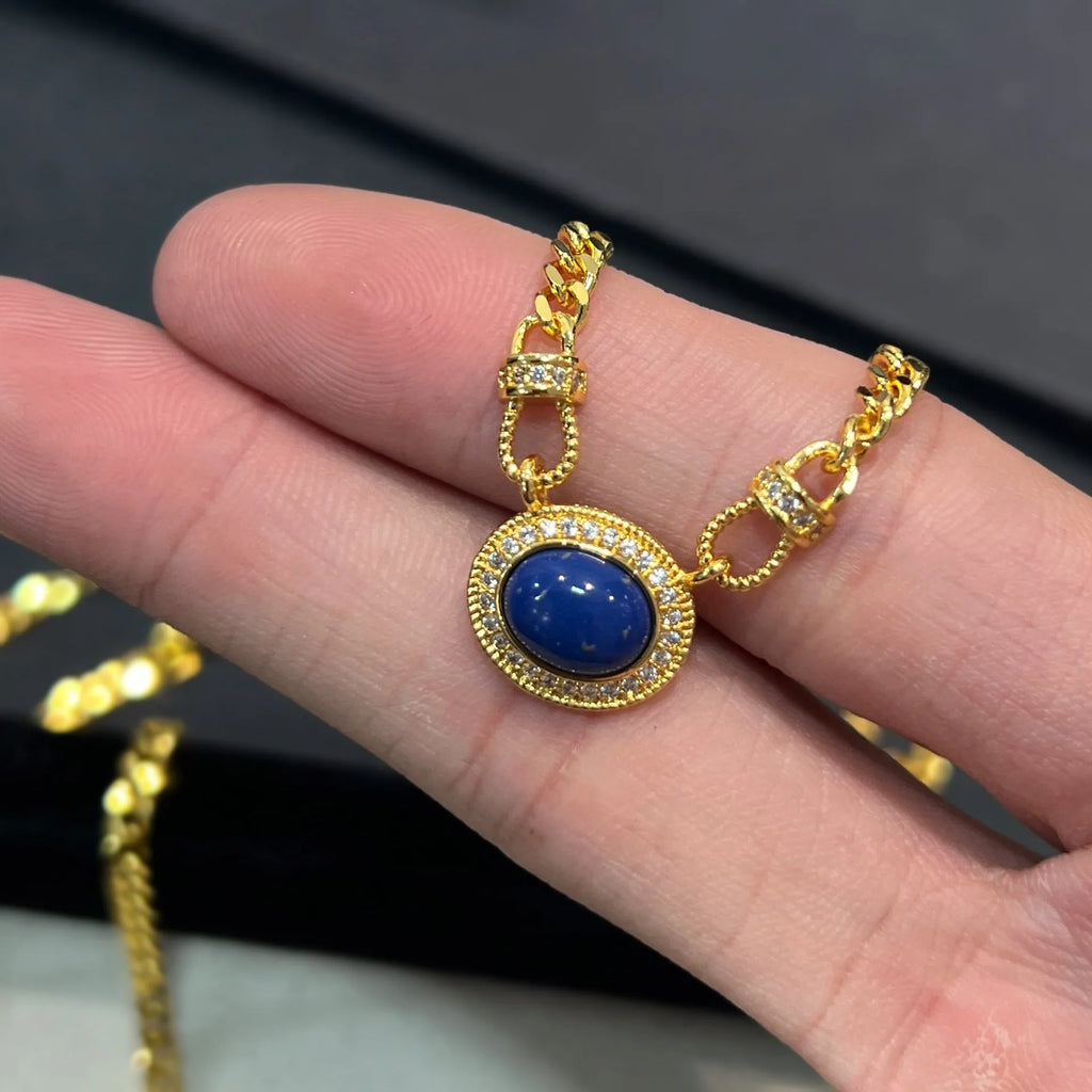 Women's geometric lapis lazuli pendant necklace on copper Cuban chain, collarbone length