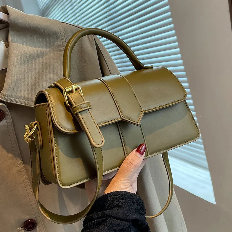 Women's beige messenger bag with adjustable strap showing internal file compartment and outer sandwich pocket