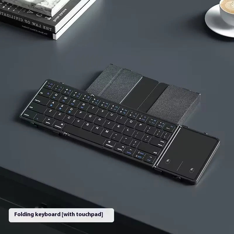 Black folding Bluetooth keyboard for tablets with silent membrane keys showing touchpad variant