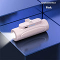 Black or pink power bank with integrated LED flashlight, 5000mAh capacity, 83mm length