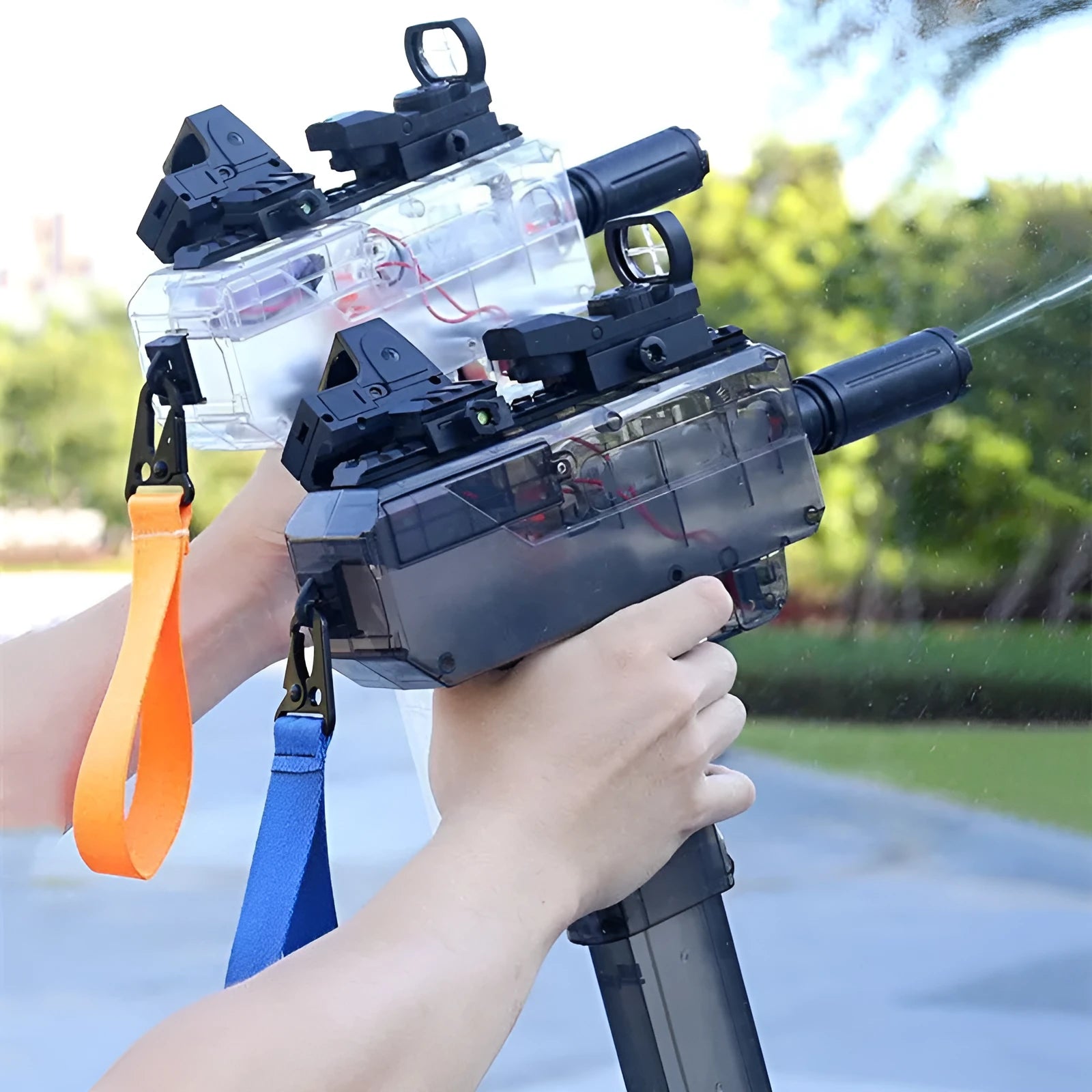 Uzi Electric Burst Water Gun in tan with transparent body, holoscope, and silencer accessories