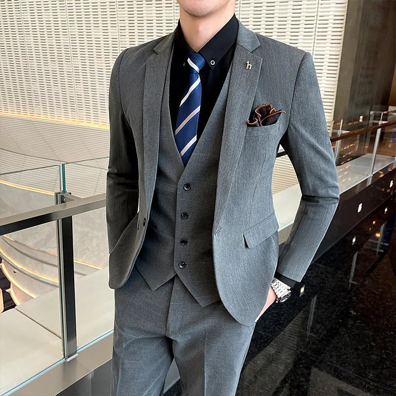 Men's slim fit British style business suit in black and dark grey cotton blend fabric