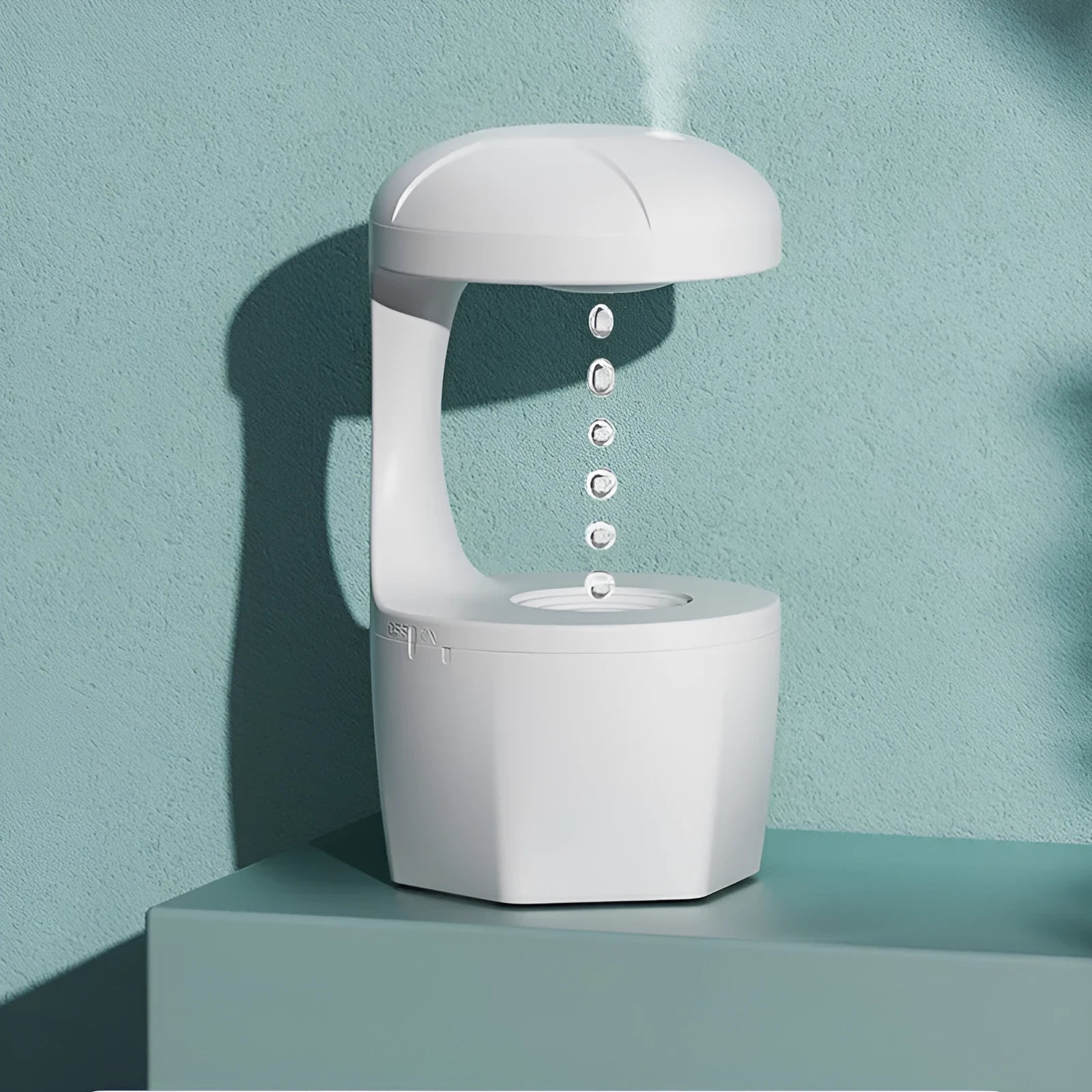 Suspended anti-gravity ultrasonic humidifier in white column shape with USB cord and plastic body