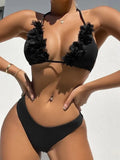 Black women's two-piece polyester swimsuit set with top and shorts on a mannequin