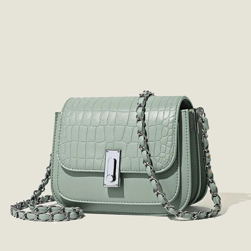Women's black PU chain shoulder bag with horizontal square design showing mobile phone pocket
