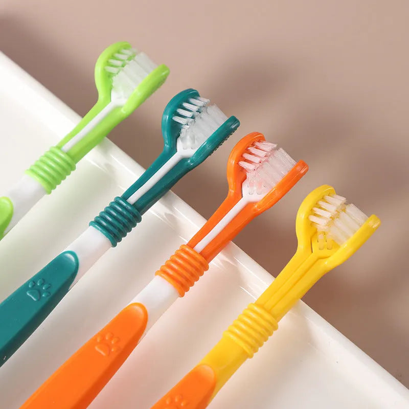 Pet toothbrush oral cleaning product with plastic handle and nylon bristles in assorted colours