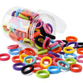 Small jar containing 100 multicoloured seamless cotton hair elastics for babies and toddlers.