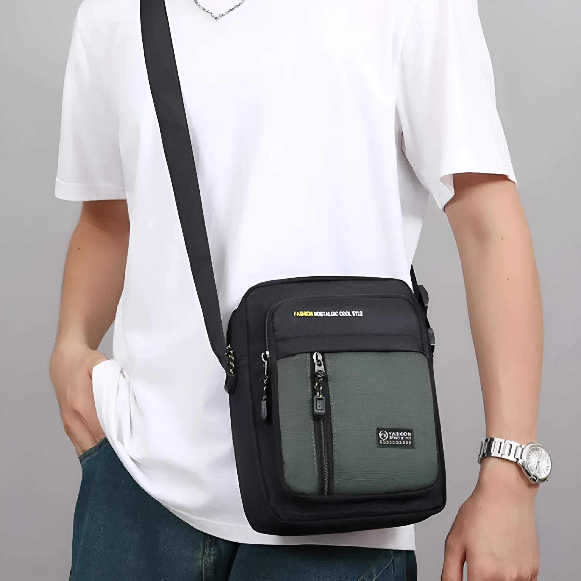 Men's green nylon crossbody messenger bag with one shoulder strap and sewing thread detailing