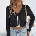 Women's khaki casual coat with lace-up front and hollow-out pattern detail on long sleeves