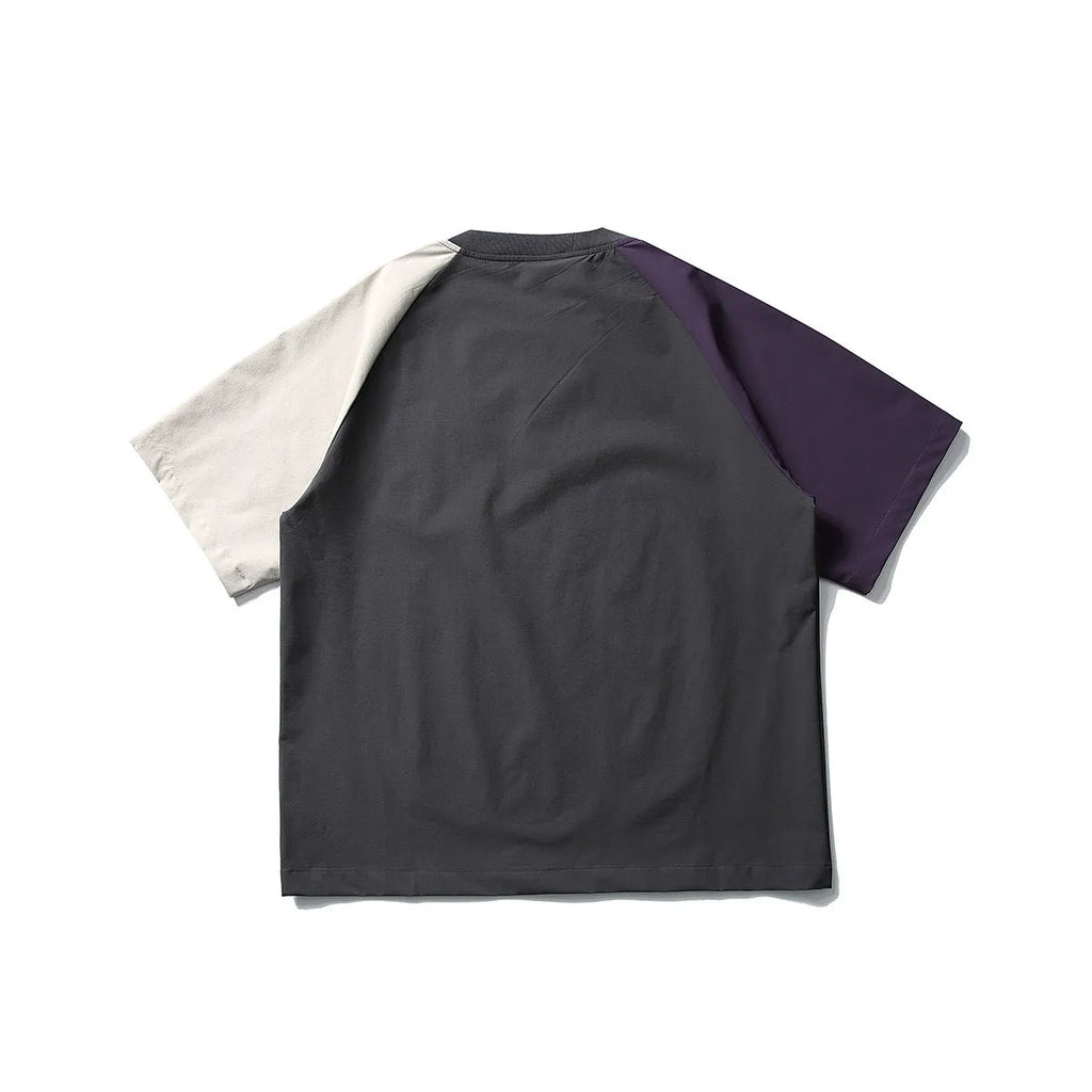 Dark grey men's loose fit t-shirt with contrasting colour raglan short sleeves.