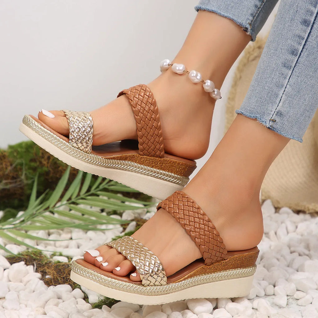 Gold women's wedge sandal with PU upper and rubber sole, shown from the side.