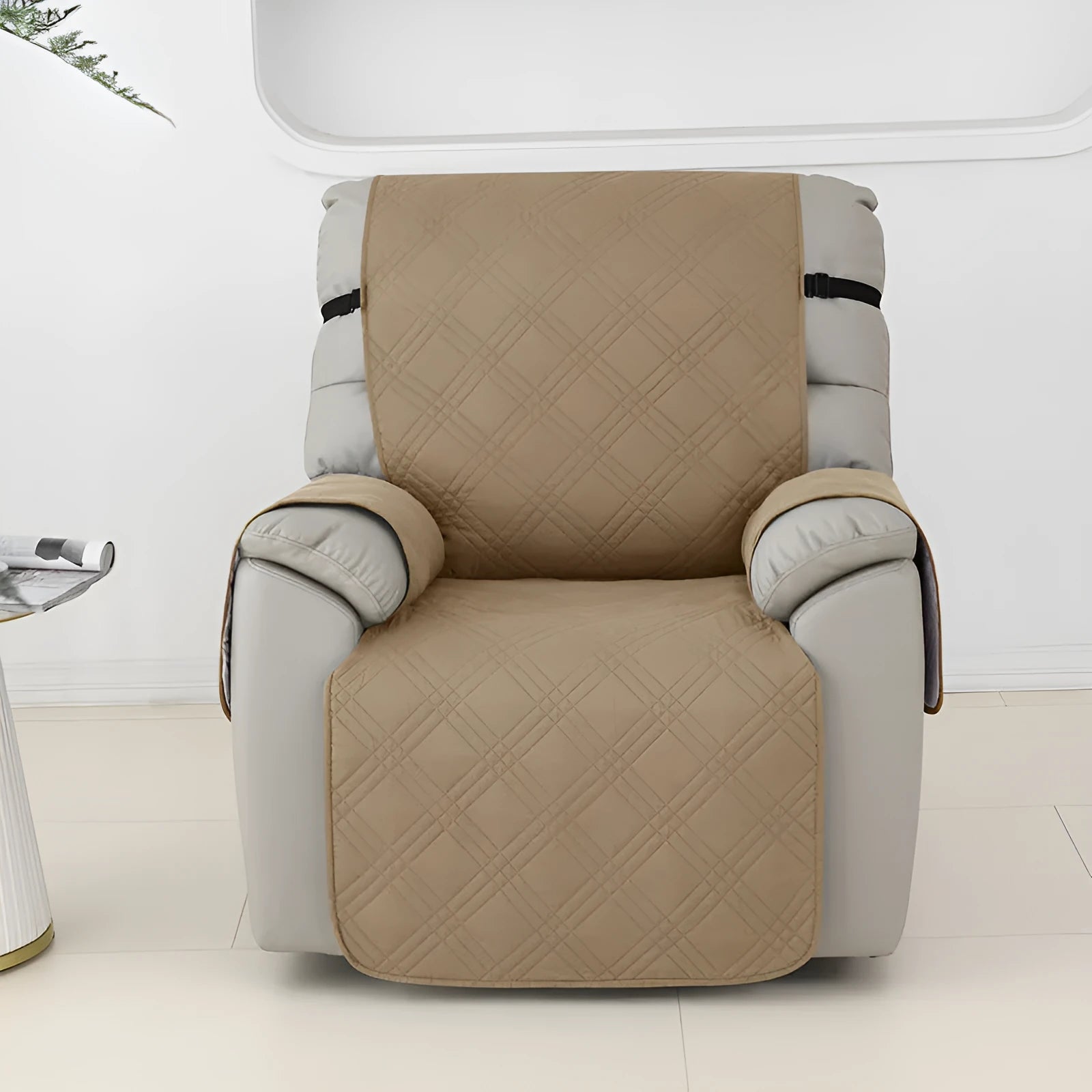 Quilted waterproof sofa cover fitted on a Chivas massage chair, shown in peacock blue colour.