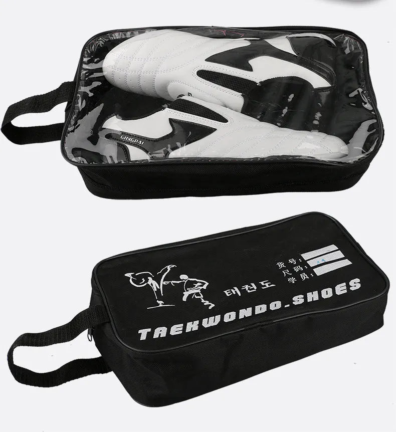 Black and white children's martial arts training shoes with soft bottom construction and widened design