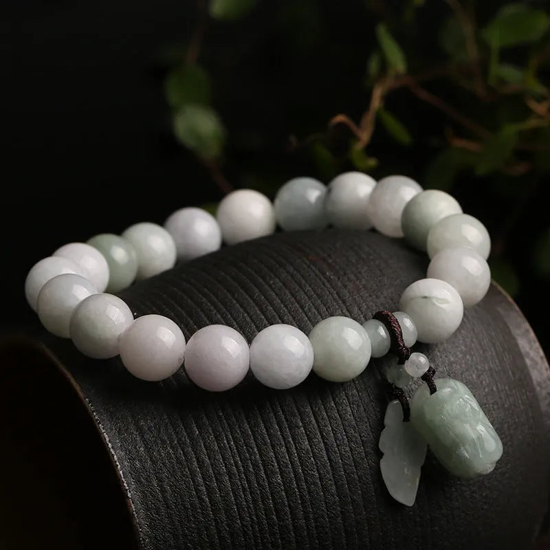 Natural emerald jade bracelet with geometric pendant and Maitreya Buddha charm