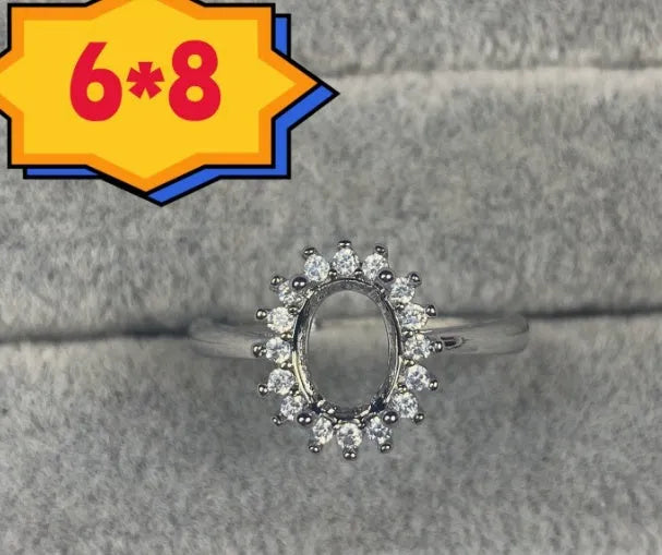 Oval denier ring with 6*8 stone, open mouth setting and star detail in Korean style