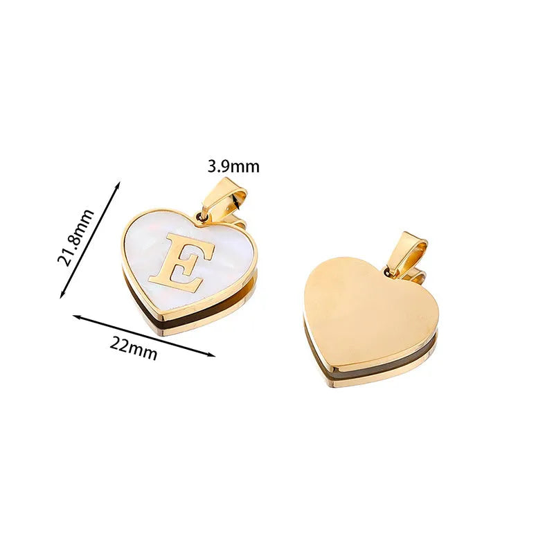 Personalised white shell heart necklace with gold chain and initial letter engraving