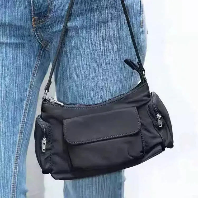 Black PU leather women's shoulder bag with double pockets and side line detailing