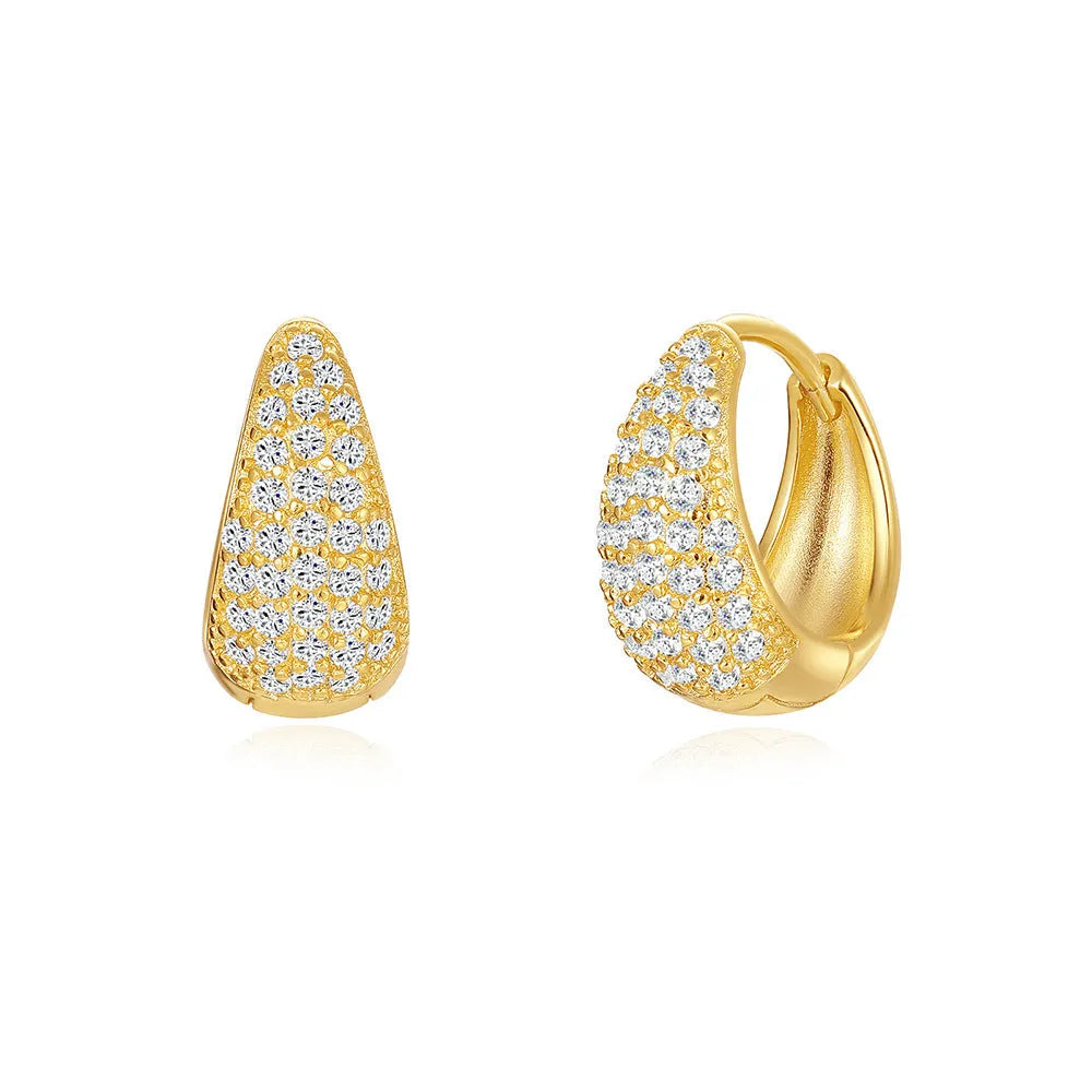 Golden brass diamond earclip earrings with simple geometric round design on white background