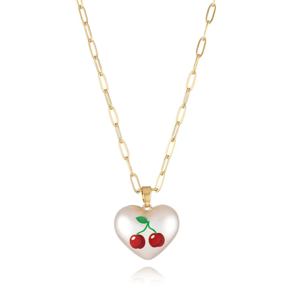Geometric fruit pendant necklace on adjustable 21-50cm chain with strawberry, pineapple, apple, cherry, and pear colour options