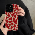 All-inclusive imitation leather phone case with full screen red love heart design for Apple iPhone.