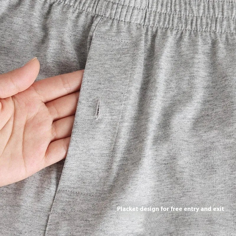 Men's solid colour cotton boxer shorts with a high waist and loose fit.