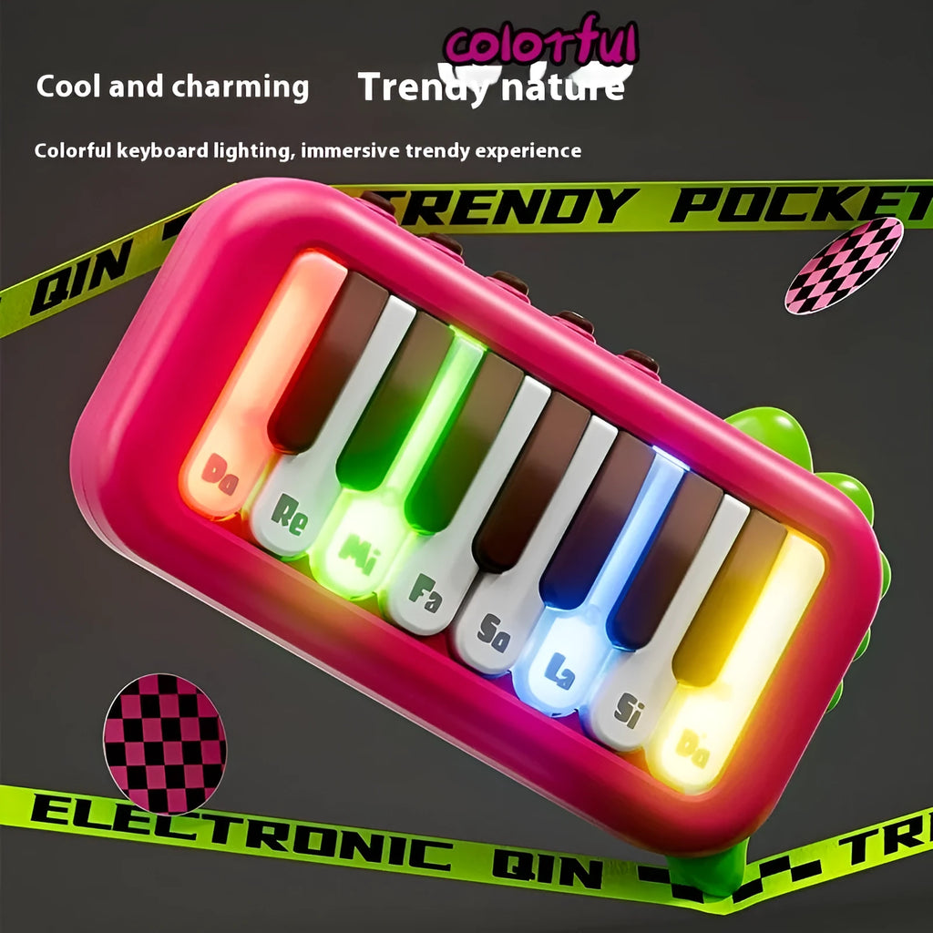 Baby pocket electronic keyboard with little piano pattern in green plastic design