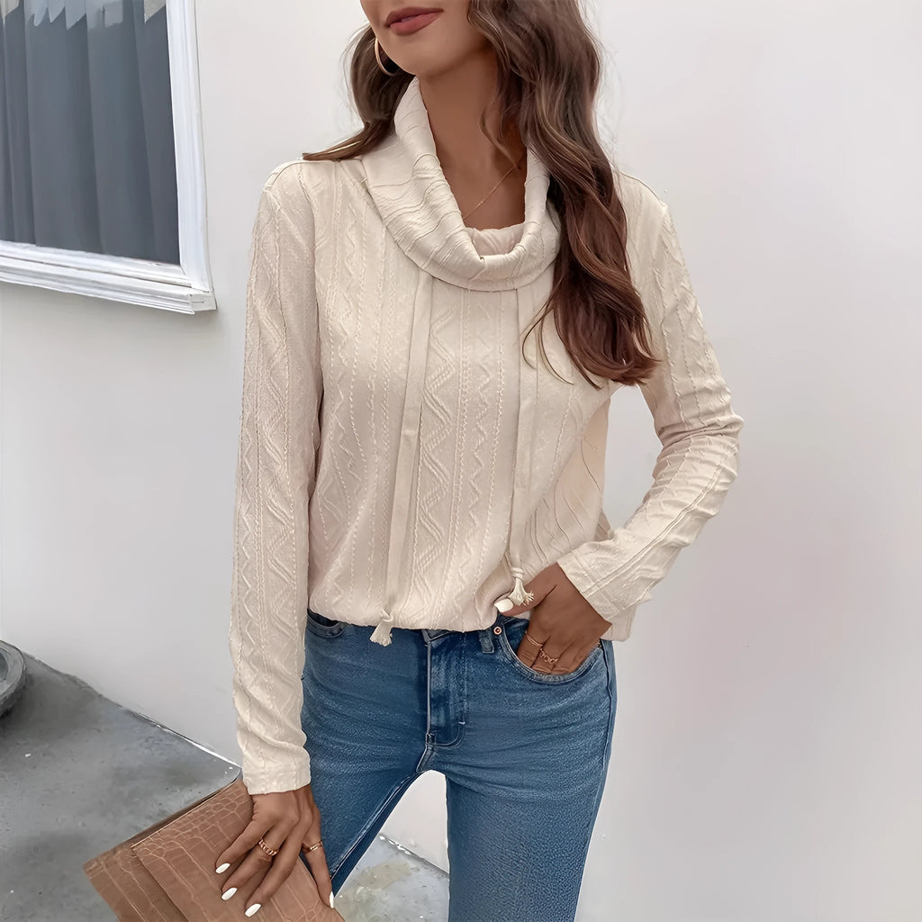 Apricot coloured long sleeve hooded pullover sweater with drawstring on mannequin