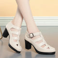 Women's beige closed toe sandals with a chunky heel, woven upper, and ankle strap buckle.