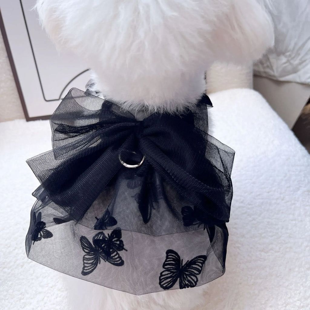 Black tulle princess skirt pet costume on small dog with size chart showing five available sizes