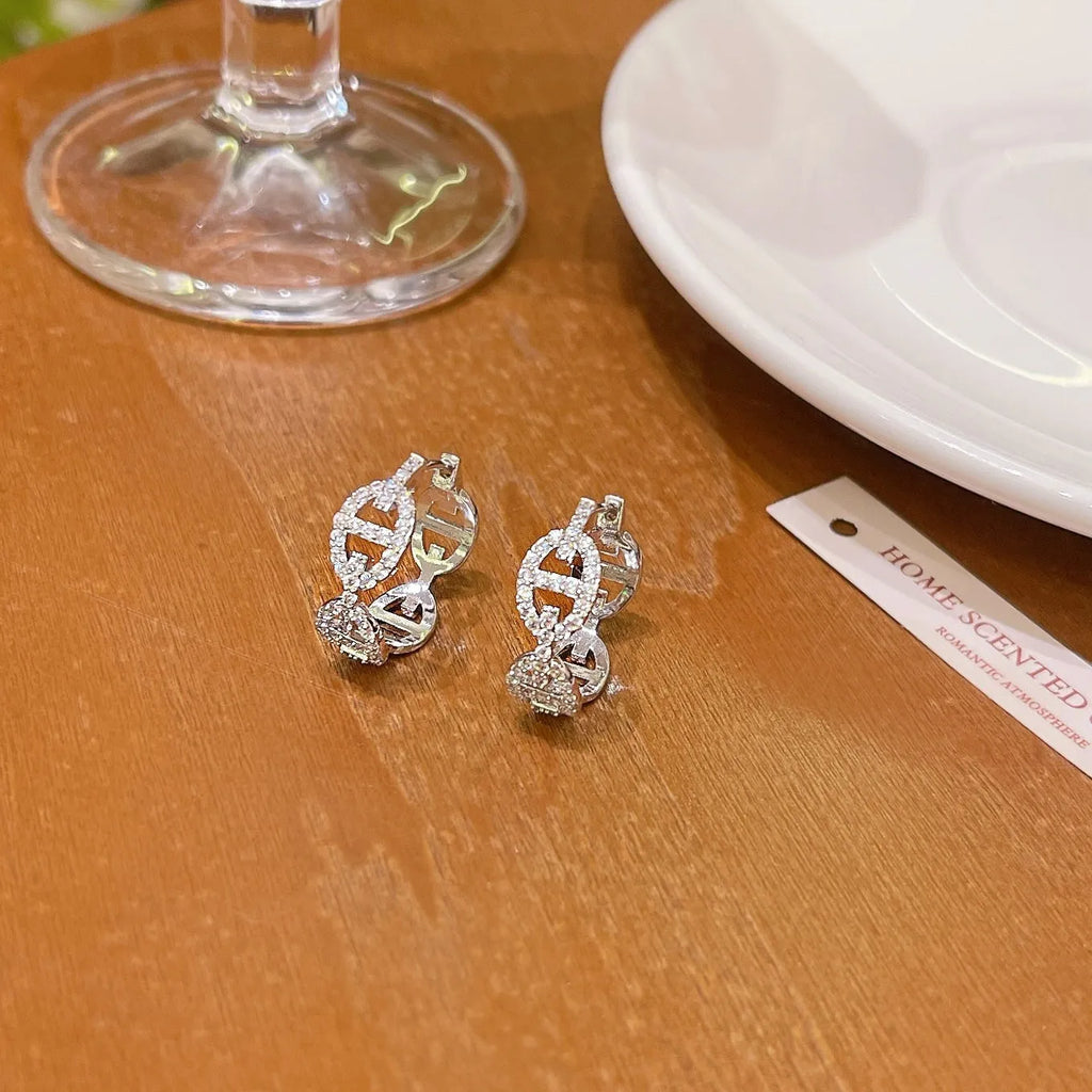 Women's casual diamond earrings with thick gold electroplated finish in silver, gold, and rose gold options.