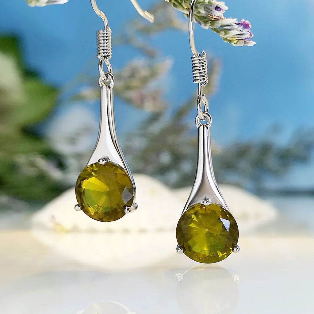 Olive green topaz drop earrings with minimalist water drop shape on alloy backing