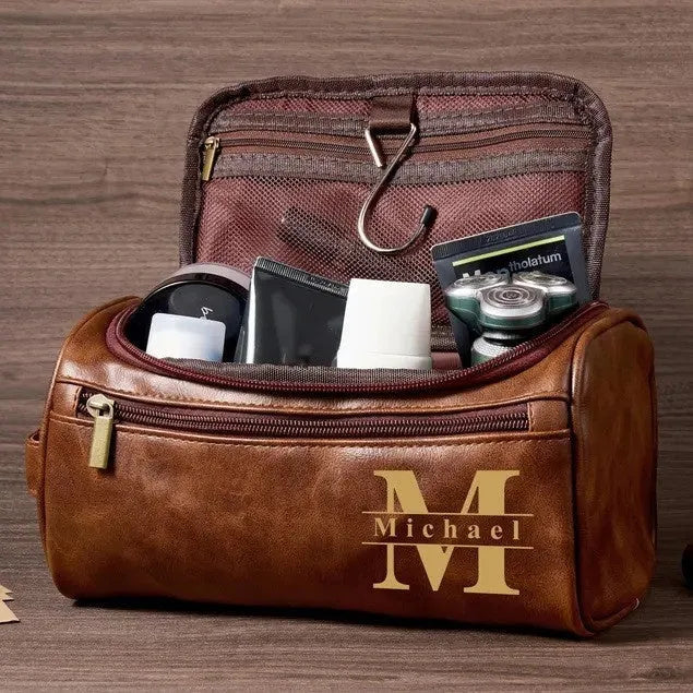 Men's black PU leather travel toiletry bag with included makeup bag for bathroom storage