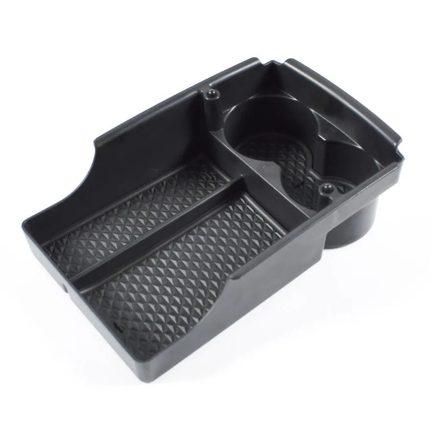 Tesla Model 3 centre console storage box retrofit kit shown installed in vehicle armrest