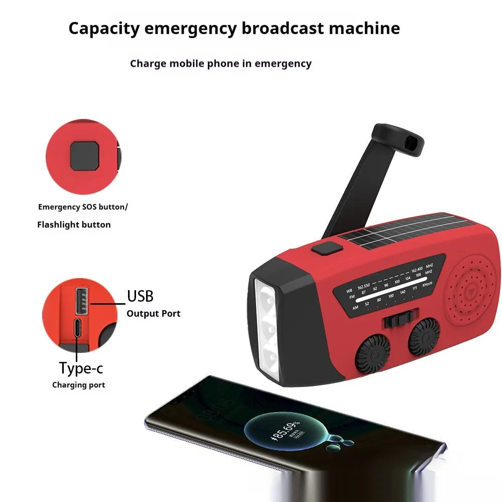 Red rechargeable emergency hand radio with torch, built-in speaker, wrist strap, and Type-C charging cable.