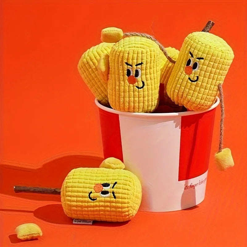 Corn cob shaped cat toy made from natural polio wood on a white background.