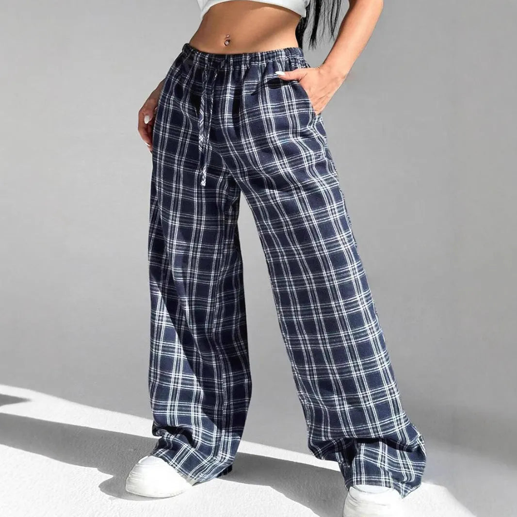 Women's loose fit plaid trousers with drawstring waist and side pockets in polyester fabric