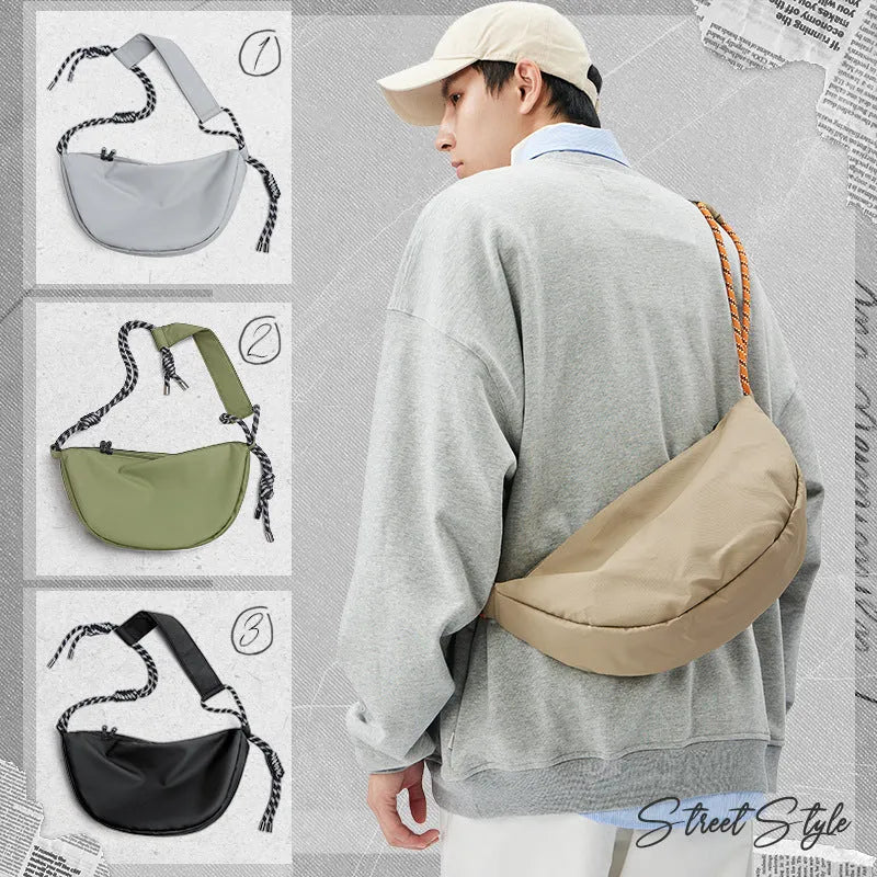 Men's large capacity nylon messenger bag in a solid colour for commuting.