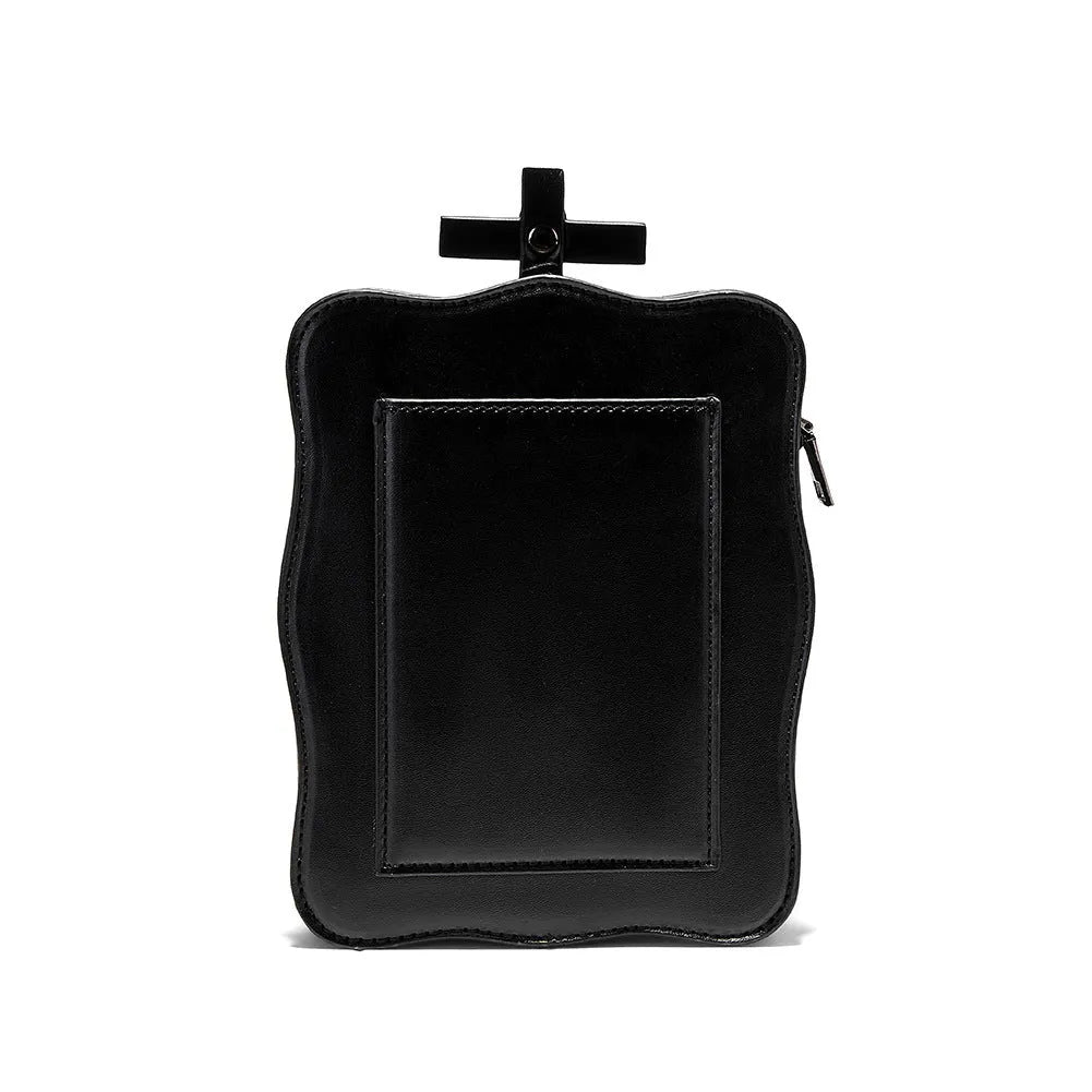 Black mini square shoulder bag with Gothic skull embossed design, chain strap, and zipper opening