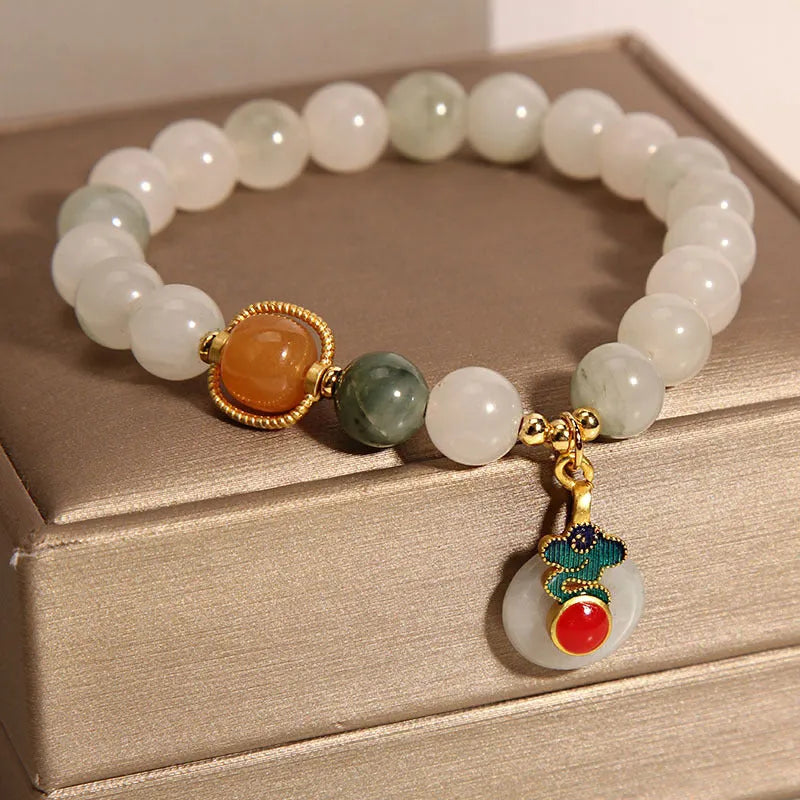 Translucent green ice jade bracelet with Xiangyun peace buckle and pearl decorative elements