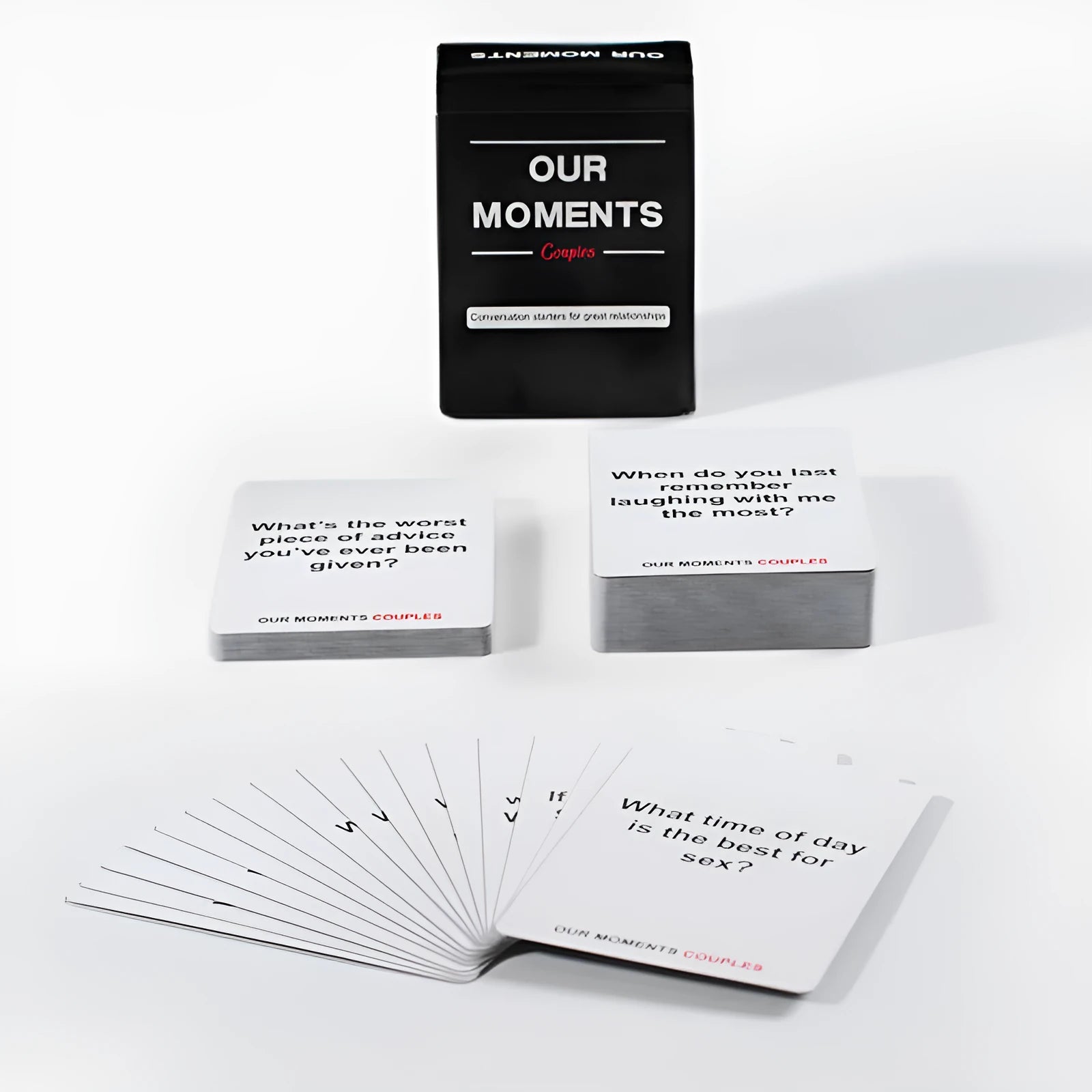Black box of Our Time Lovers Edition English communication cards for couples on a table.
