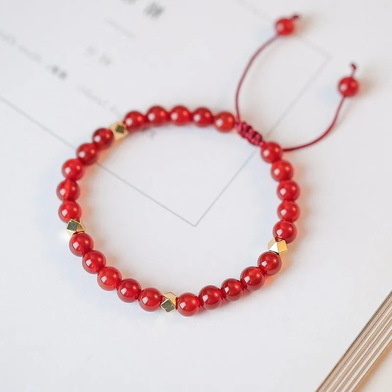 Hand-woven red agate bracelet with ethnic styling and electroplated finish
