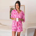 Pink bow print polyester pajama set with matching top and trousers for women