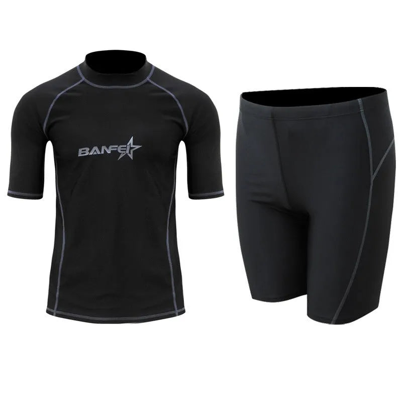 Men's half-sleeve nylon swimsuit set in blue for snorkelling and surfing with matching top and pants